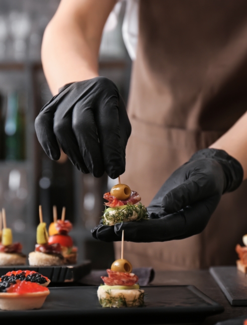 Chef holding canape